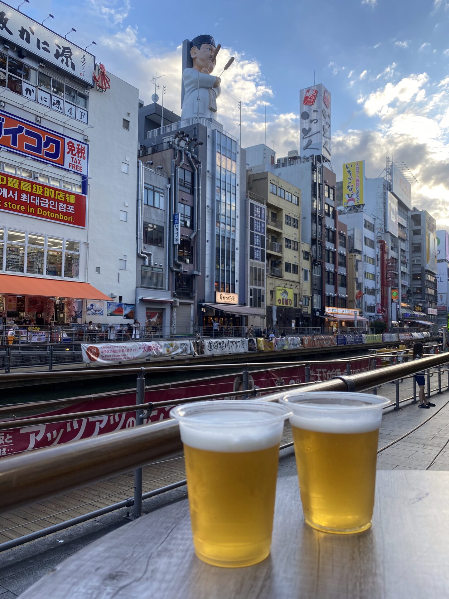 Enjoying beer in Dotonbori